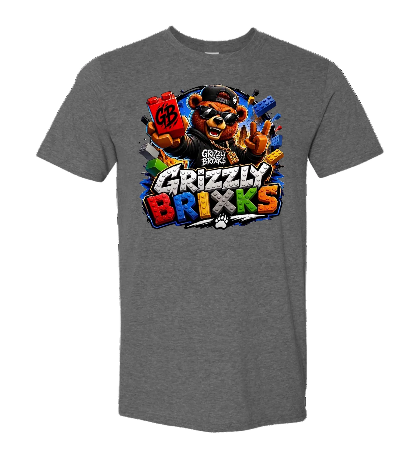 A heather gray short-sleeve crewneck t-shirt featuring a colorful graphic print of a grizzly bear wearing a cap and sunglasses, holding a red brick with 'GB' on it, and the text 'Grizzly Brixks' in stylized multicolor lettering.