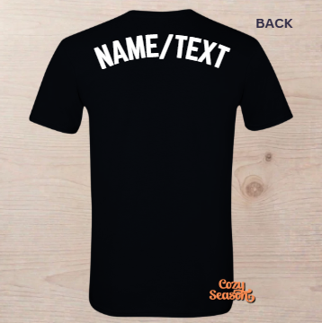 Black short-sleeve t-shirt shown from the back on a light wood background, with large white 'NAME/TEXT' placeholder text across the upper back and a small 'Cozy Season' logo near the lower right hem.