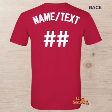 Red short-sleeve t-shirt shown from the back on a light wood background, with white customizable text reading 'NAME/TEXT' and '##' on the back. A small 'Cozy Season' logo appears near the bottom right, and 'BACK' is printed in the top right corner.