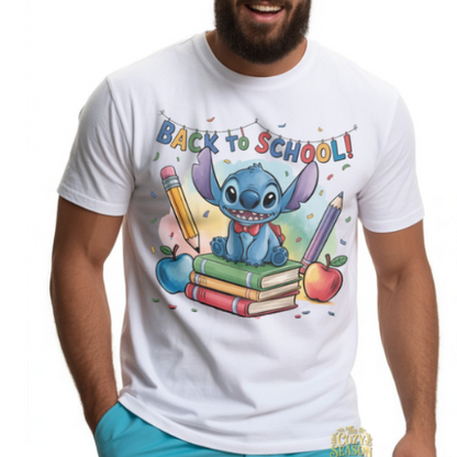 White unisex t-shirt with a vibrant "Back to School" design featuring a smiling blue alien sitting on school books flanked by giant pencils.