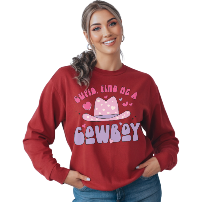 Woman wearing a red sweatshirt with a pink cowboy hat graphic and text on a white background