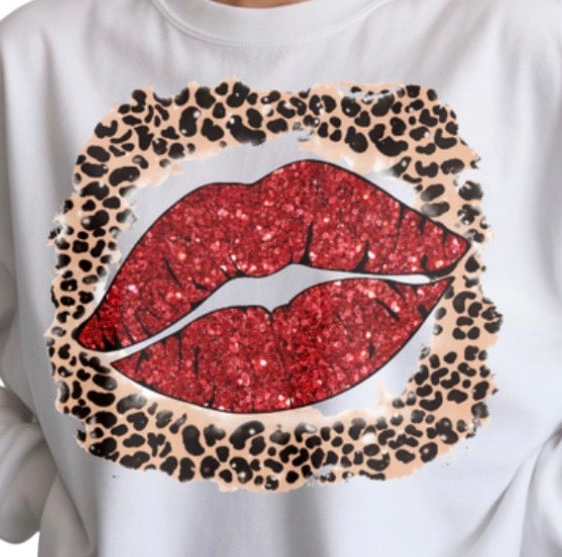 White sweatshirt with red glittery lips and leopard print border