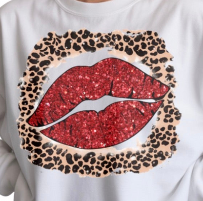 White sweatshirt with red glittery lips and leopard print border
