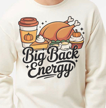 Person wearing a white sweatshirt with Thanksgiving-themed graphics and 'Big Back Energy' text.