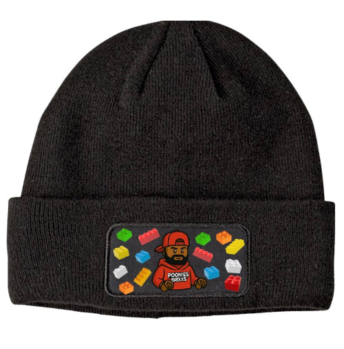 Black beanie with a colorful patch featuring a character and text on a white background
