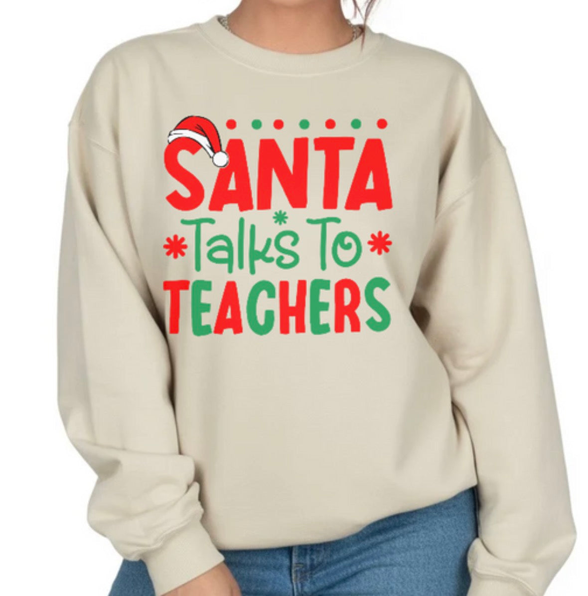 Beige sweatshirt with 'Santa Talks To Teachers' text and Santa hat graphic on a white background