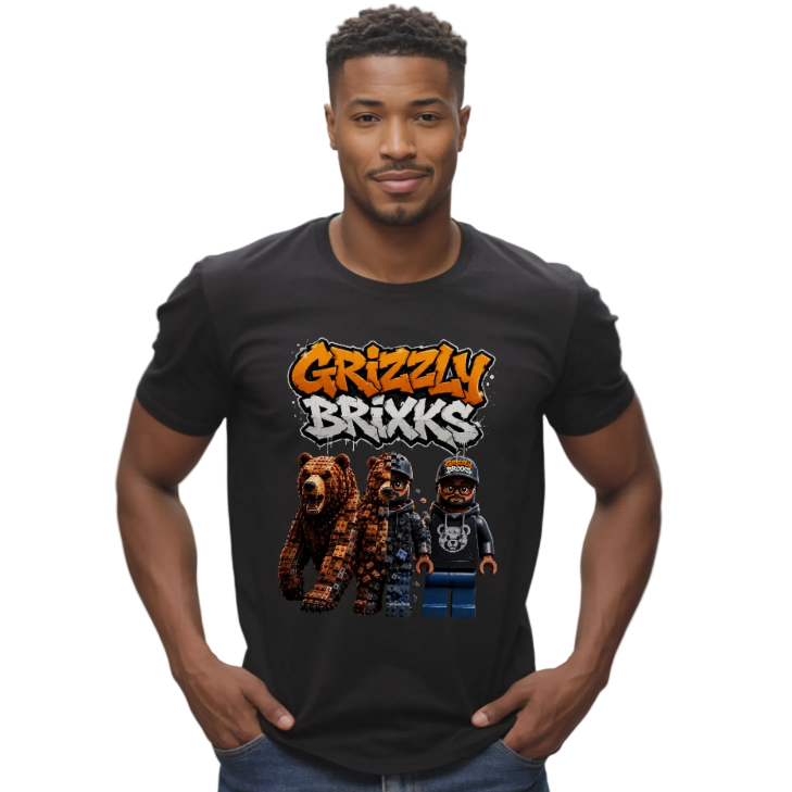 A man wearing a black t-shirt with a colorful graphic that reads 'Grizzly Brixxs' above three cartoon grizzly bear characters, set against a plain white background.