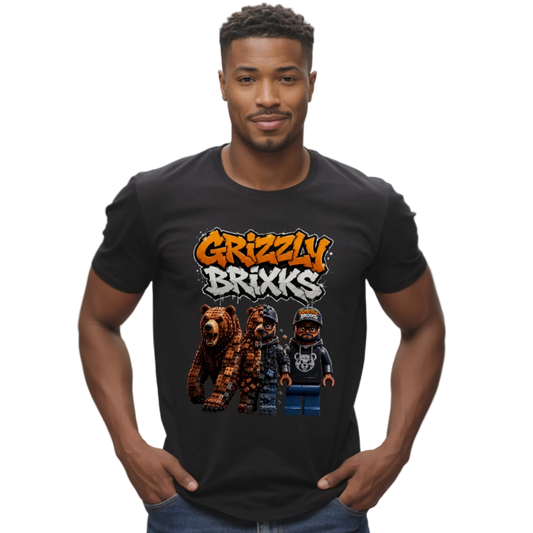 A man wearing a black t-shirt with a colorful graphic that reads 'Grizzly Brixxs' above three cartoon grizzly bear characters, set against a plain white background.
