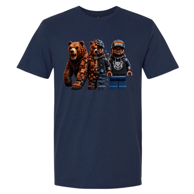 A navy blue short-sleeve t-shirt with a graphic print of three blocky, toy-like figures resembling LEGO minifigures, including a brown bear and two human figures, shown on a plain white background.