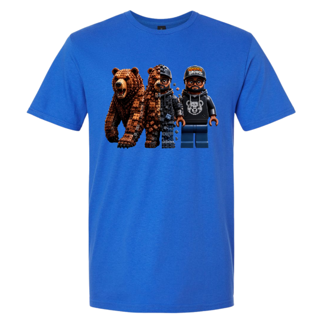A bright blue short-sleeve crewneck t-shirt featuring a graphic print of three pixel-art characters resembling LEGO minifigures and bears on the chest, shown against a plain white background.