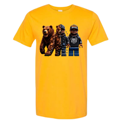 A bright yellow short-sleeve crewneck t-shirt featuring a graphic print of three bear-themed minifigures on the chest, displayed against a solid white background.