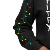 Black sweater with colorful lights and text on a dark background