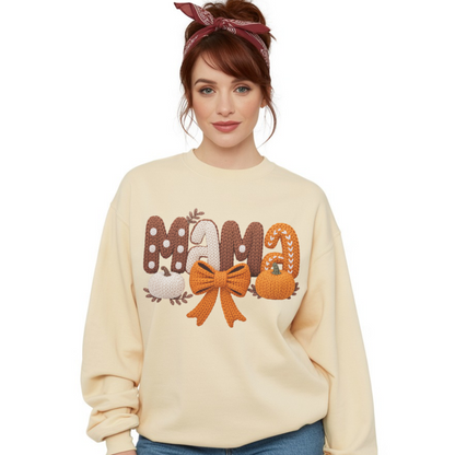 Woman wearing a beige sweatshirt with decorative text and graphics on a white background