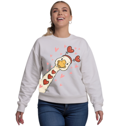 Person wearing a WHITE sweatshirt with a cartoon design of a GOOSE and hearts on a white background