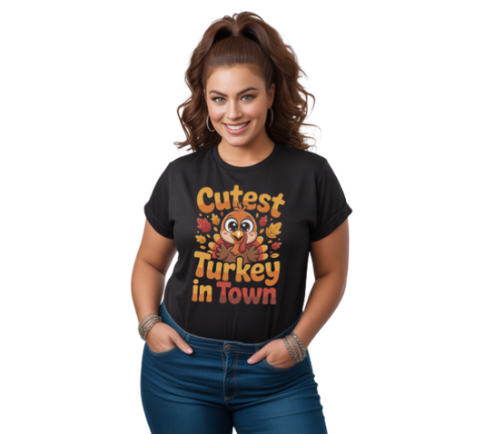 Woman wearing a black t-shirt with 'Cutest Turkey in Town' design on a white background