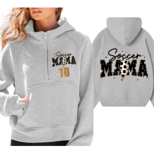 Gray hoodie with 'Soccer Mama' text on front and back, worn by a person.
