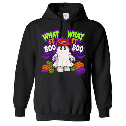 A black pullover hoodie featuring a colorful graphic on the front with the text 'WHAT IT BOO WHAT IT BOO' in neon green and white, a cartoon ghost wearing a red cap that says 'POOKER'S BIRCH', and orange, green, and purple toy blocks, shown on a plain white background.