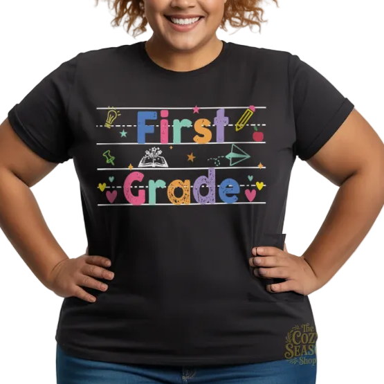 Custom grade school unisex t-shirt in black, featuring a vibrant "First Grade" chalkboard-style design with school doodles.