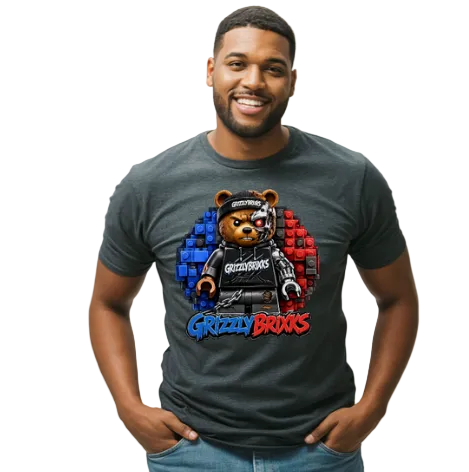 A smiling man wearing a dark gray t-shirt with a colorful graphic of a bear wearing a helmet and the text 'Grizzly Bears'.
