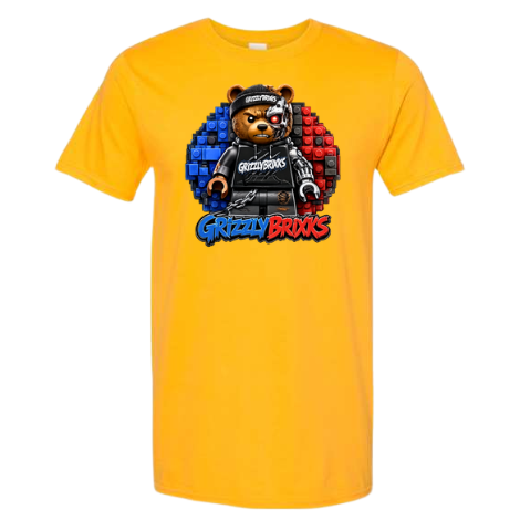 A bright yellow short-sleeve crewneck t-shirt featuring a central graphic of a grizzly bear wearing a black cap and black hoodie, with blue and red brick patterns behind it and the text 'Grizzly Bricks' below.